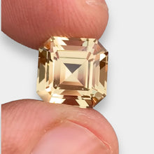 Load image into Gallery viewer, Flawless 5.25 CT Excellent Asscher Cut Natural Golden Imperial Topaz Gemstone from Katlang Mine Pakistan.