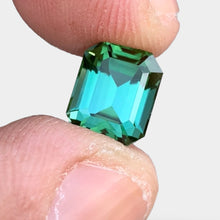 Load image into Gallery viewer, Flawless 4.03 CT Excellent Emerald Cut Natural Greenish Blue Tourmaline from Afghanistan.