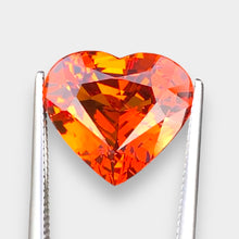 Load image into Gallery viewer, Flawless 7.38 CT Excellent Heart Shape Natural Mandarin Garnet from Nigeria.