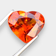 Load image into Gallery viewer, Flawless 7.38 CT Excellent Heart Shape Natural Mandarin Garnet from Nigeria.
