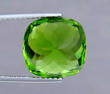 Load image into Gallery viewer, IF 10.50 Carat Green Cushion Shape Natural Peridot from Supat Mine Pakistan.