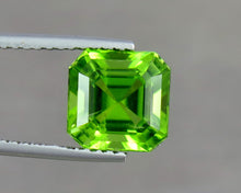 Load image into Gallery viewer, VVS 4.13 Carats Excellent Asscher Cut Green Peridot from Supat Mine Pakistan.