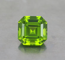Load image into Gallery viewer, 100% Eye Clean 8.62 CT Asscher Cut Natural Green Peridot from Supat Mine Pakistan.